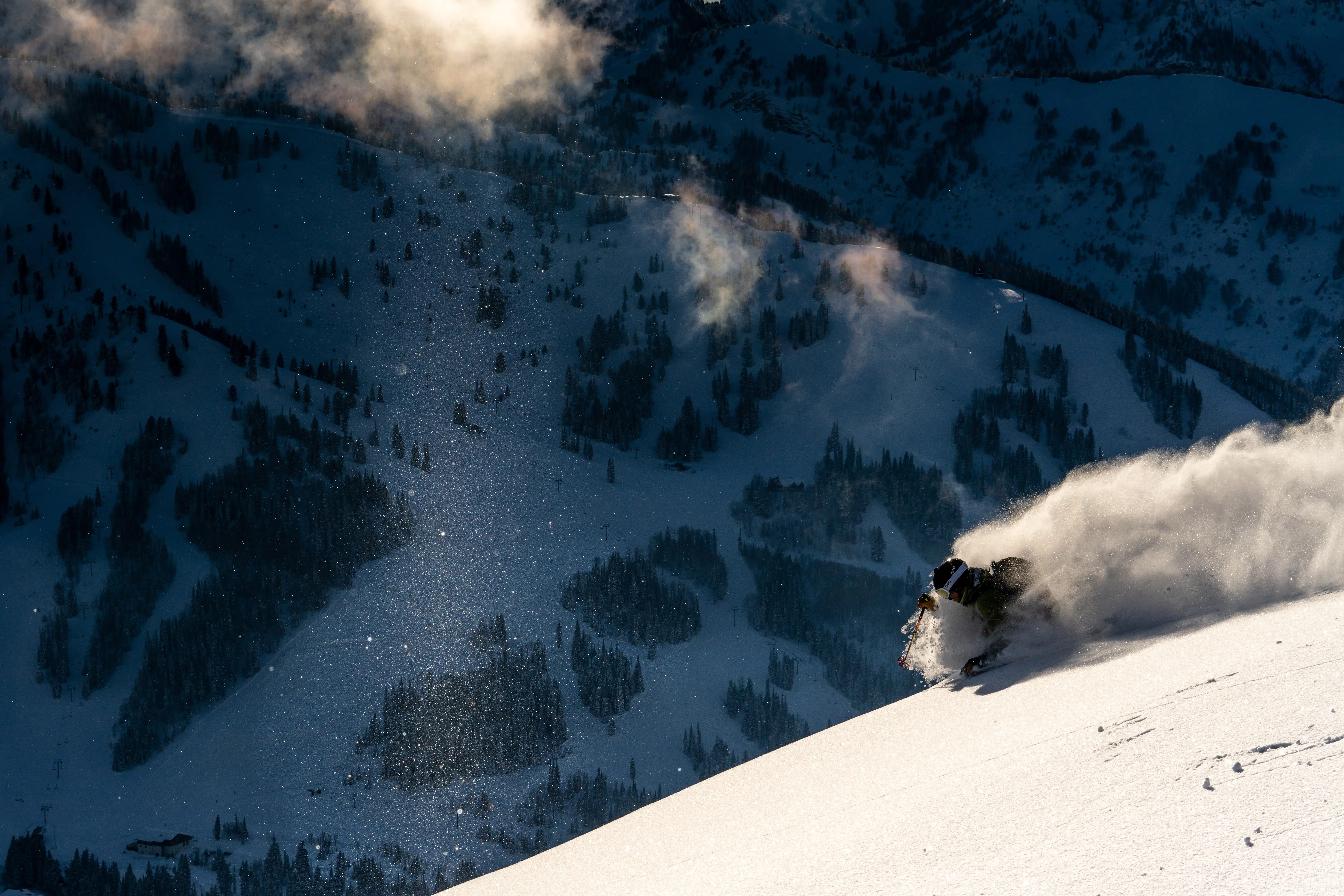 A snowskier in a heap of powder