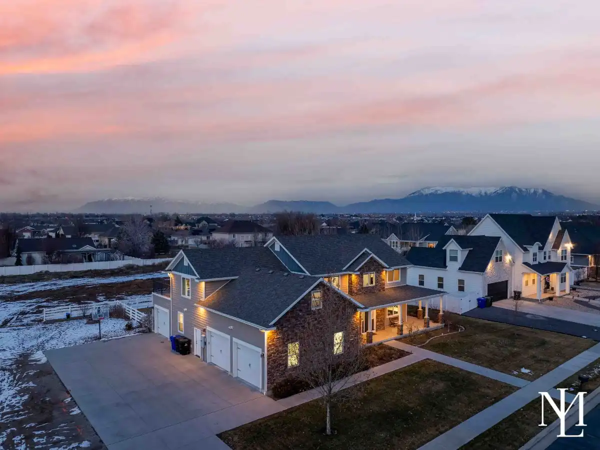 3736 W Hammon Ln Syracuse, Utah 84075 Home's Garage at Twilight