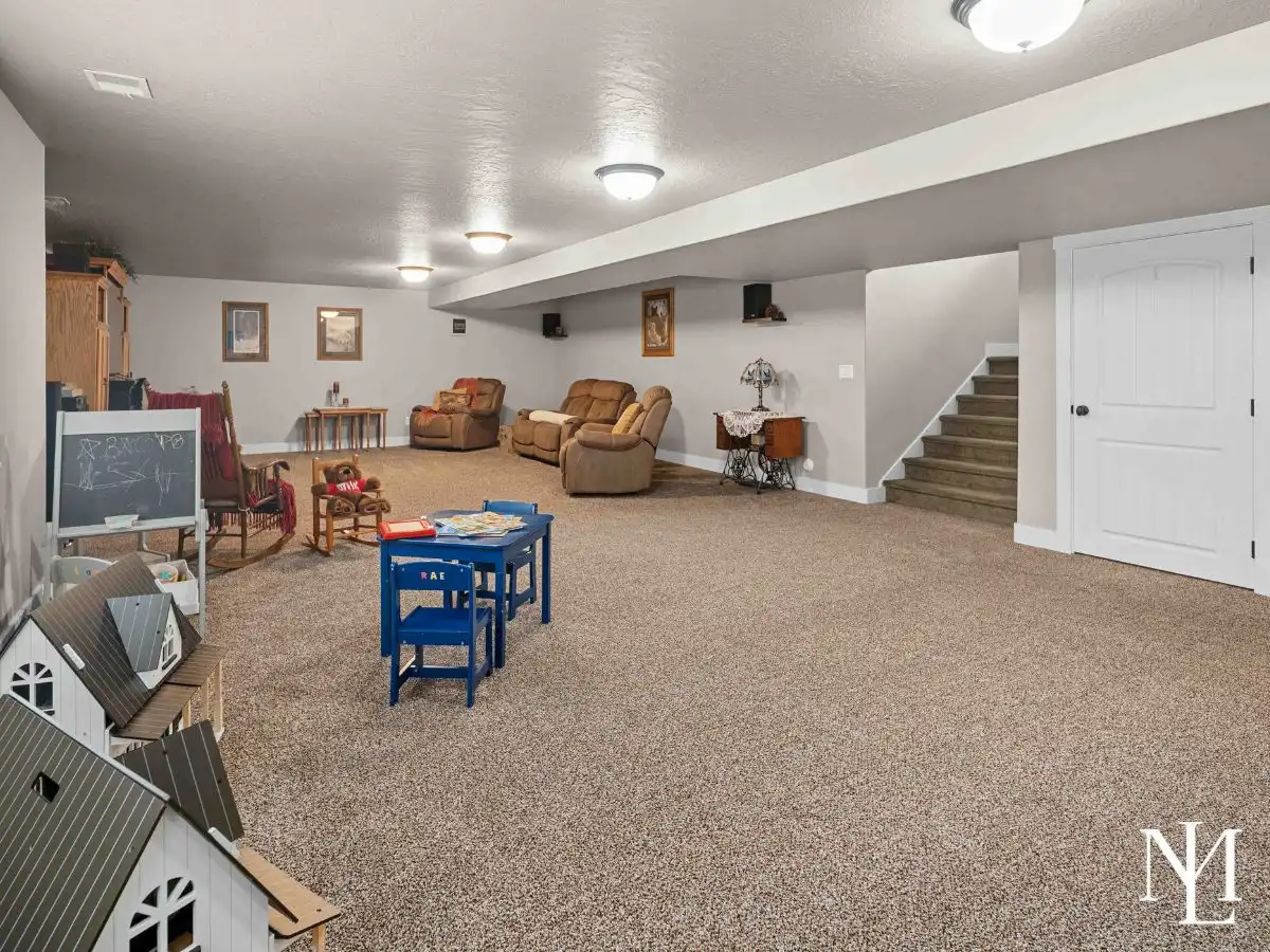 Large finished basement family room with open layout and abundant recreation space.