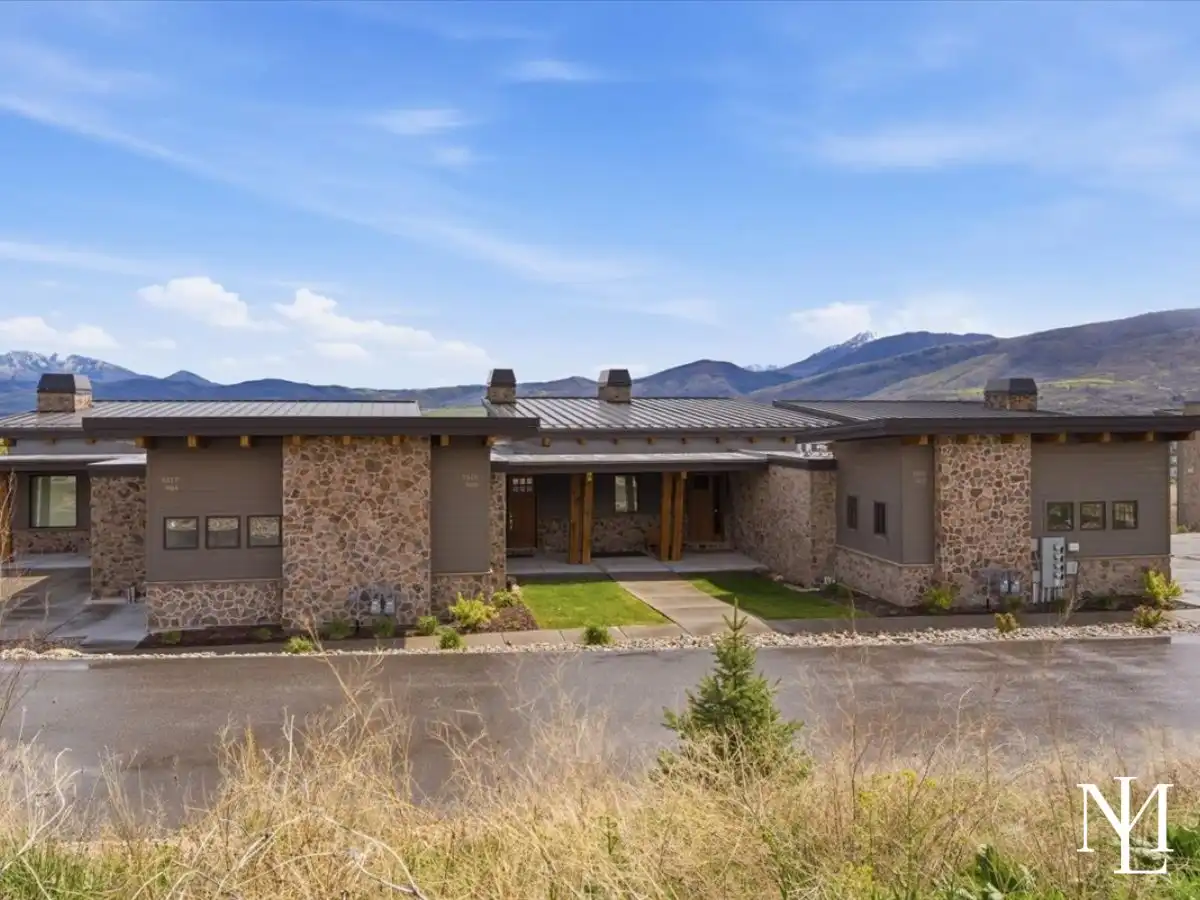 Eden, Utah exterior mountain view townhome with stone facade.