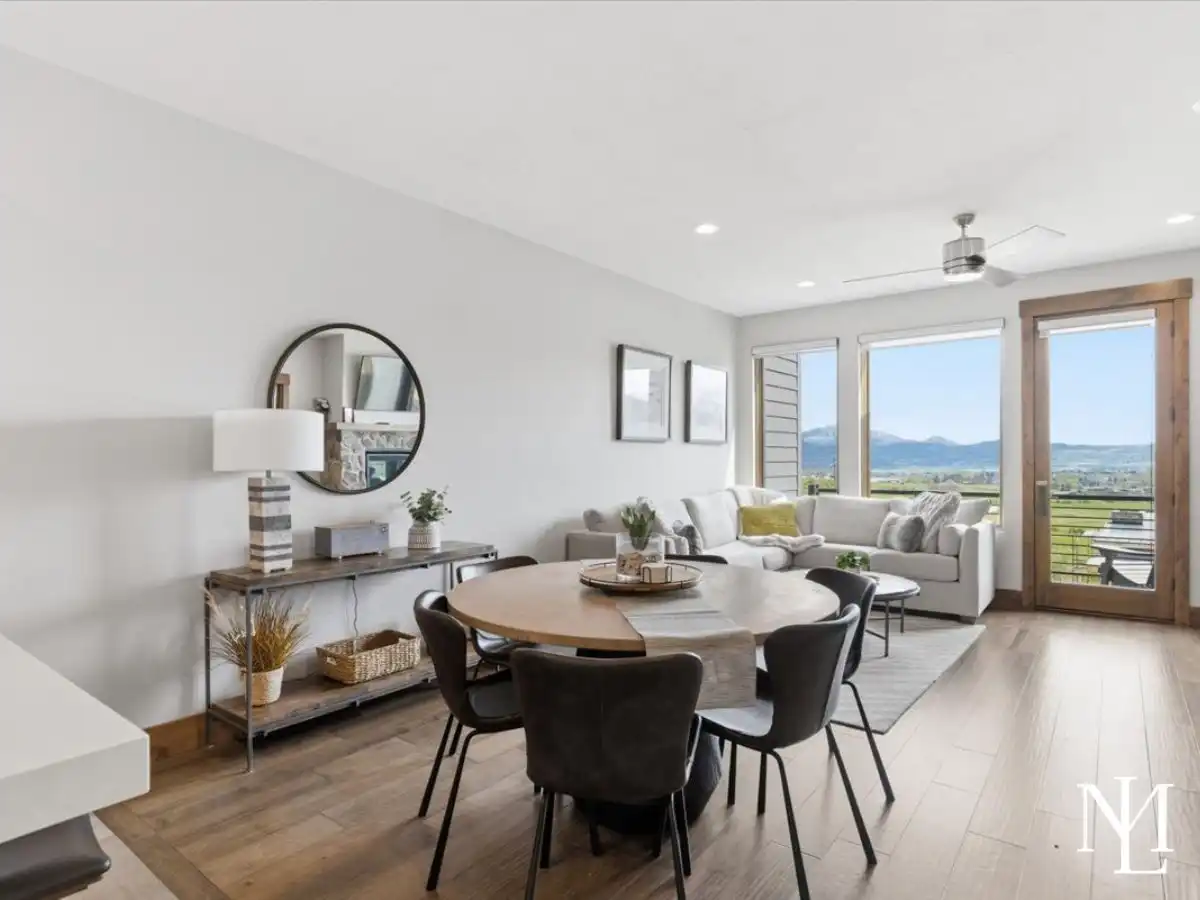 Open dining and living area with mountain views in Eden, Utah townhome