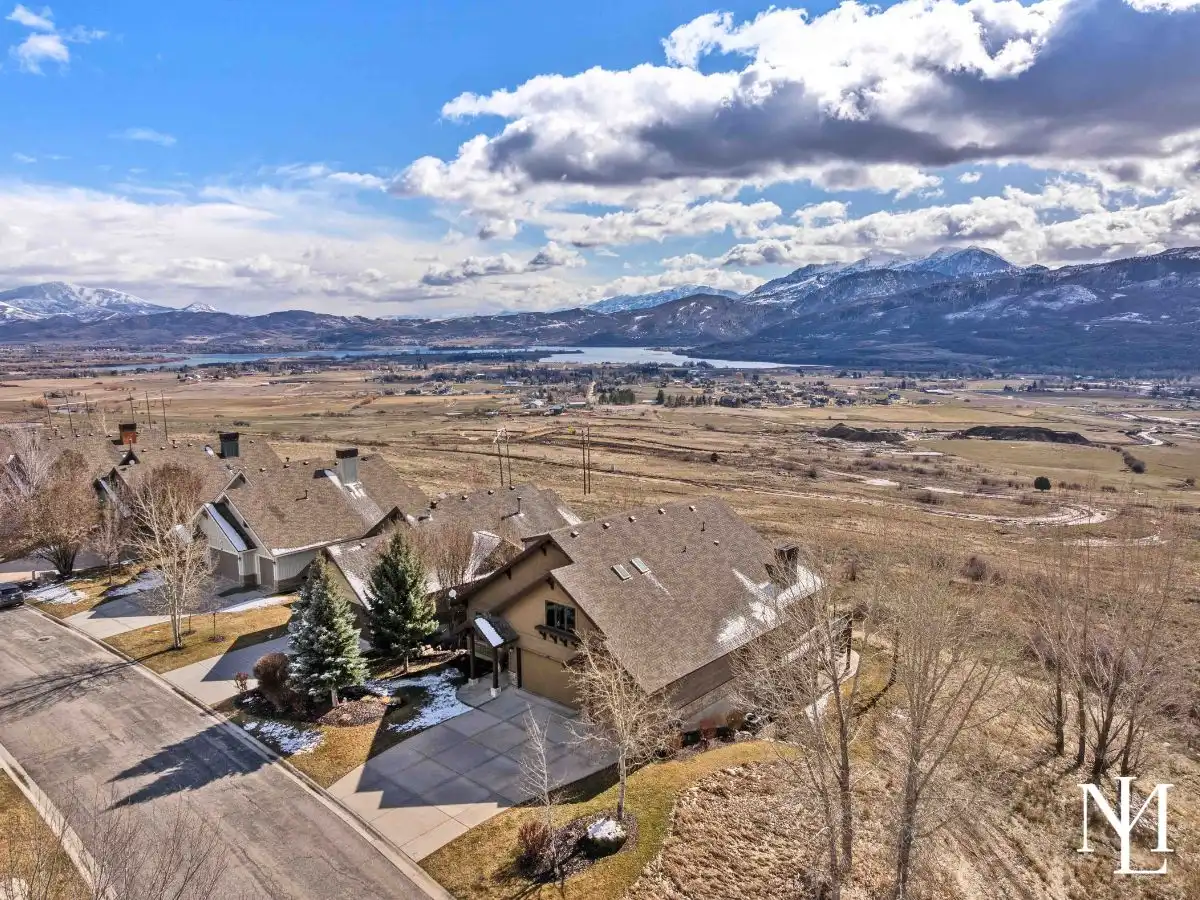 Trappers Ridge community set against Ogden Valley land, Pineview Reservoir and mountain ranges