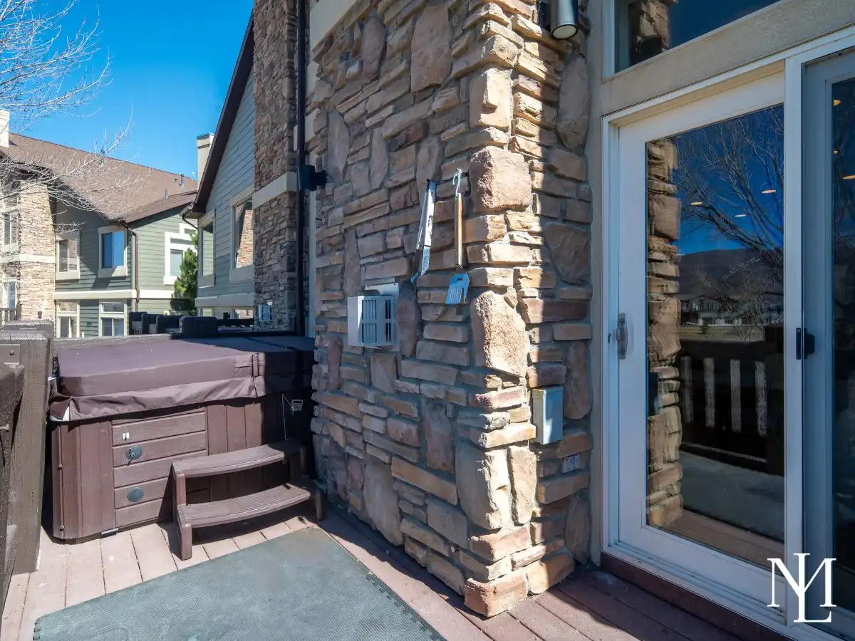 Private deck hot tub at Lakeside Village townhome in Huntsville, Utah.