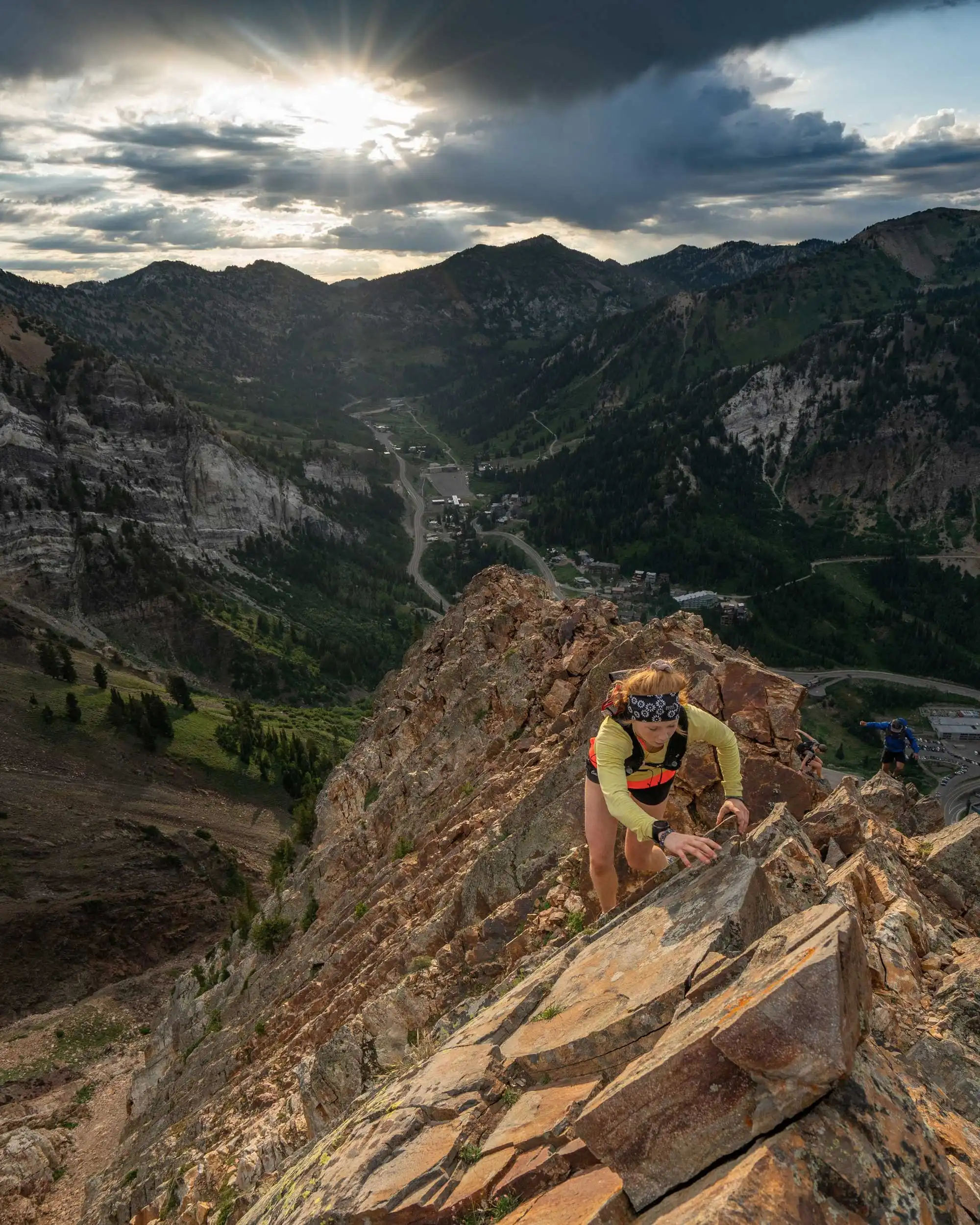 woman climbing mountain