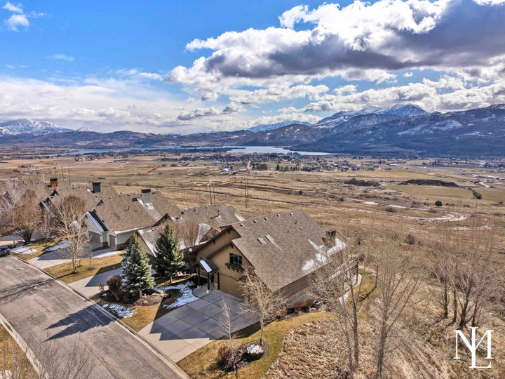 Trappers Ridge community set against Ogden Valley land, Pineview Reservoir and mountain ranges