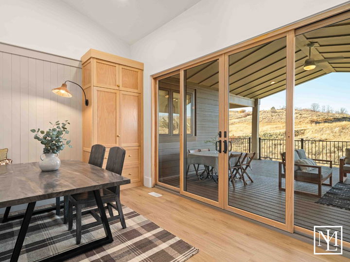 6188 E Hummingbird Pt Huntsville, UT Dining Room Leading Out To Deck
