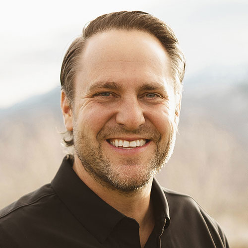 Professional headshot of Adam Stuart, Real Estate Agent