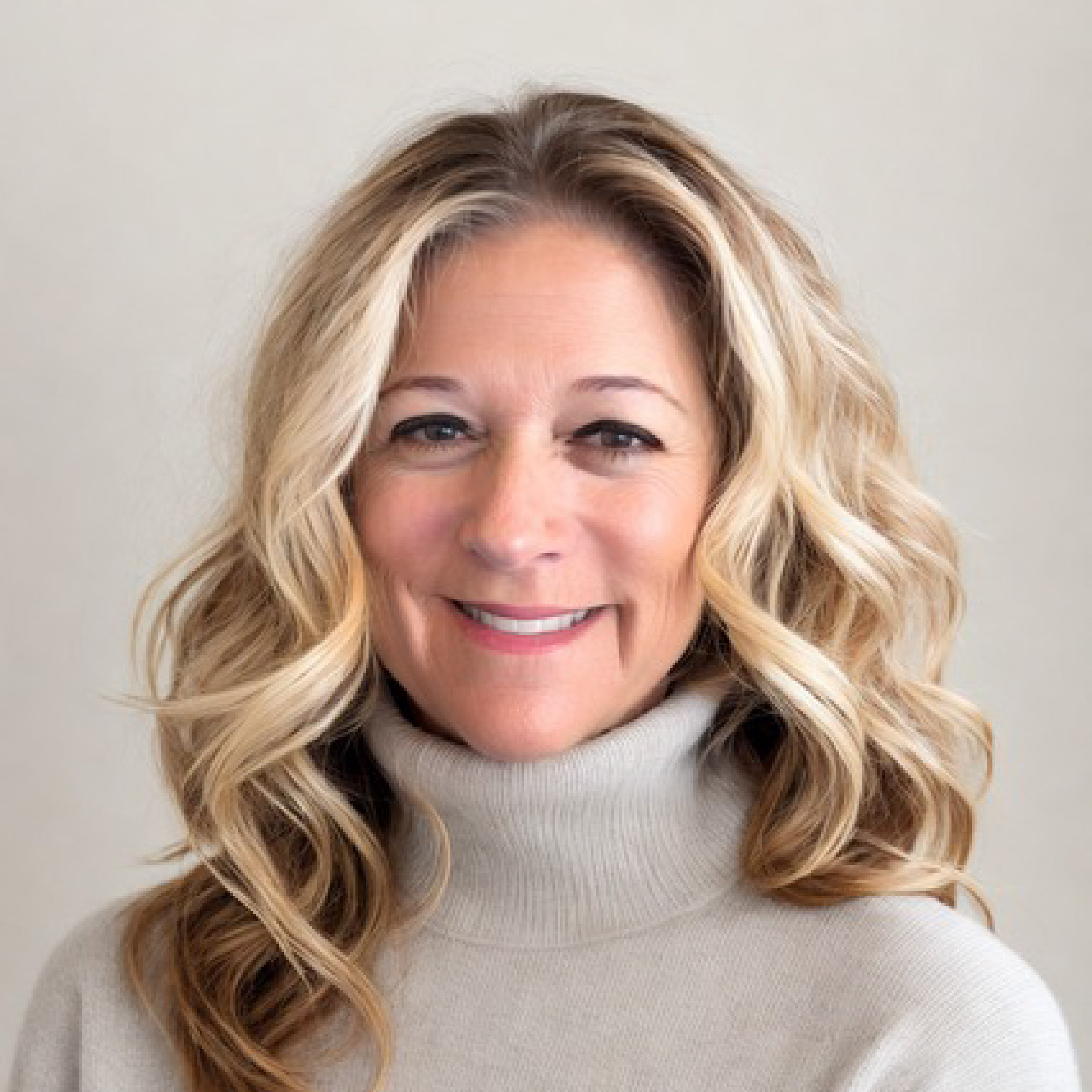 Professional headshot of Colette McQuown, Real Estate Agent