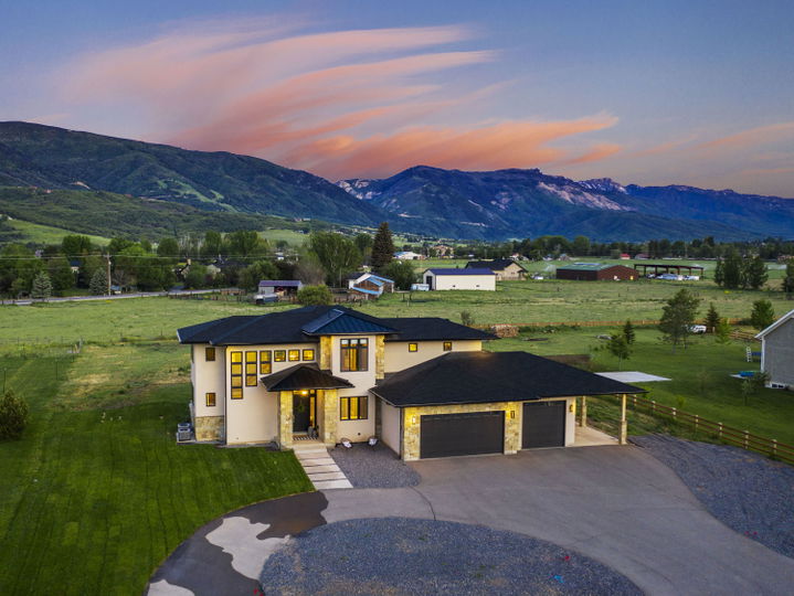 Beautiful Drone Shot of an Eden Acres Home Showcasing Mountain Views
