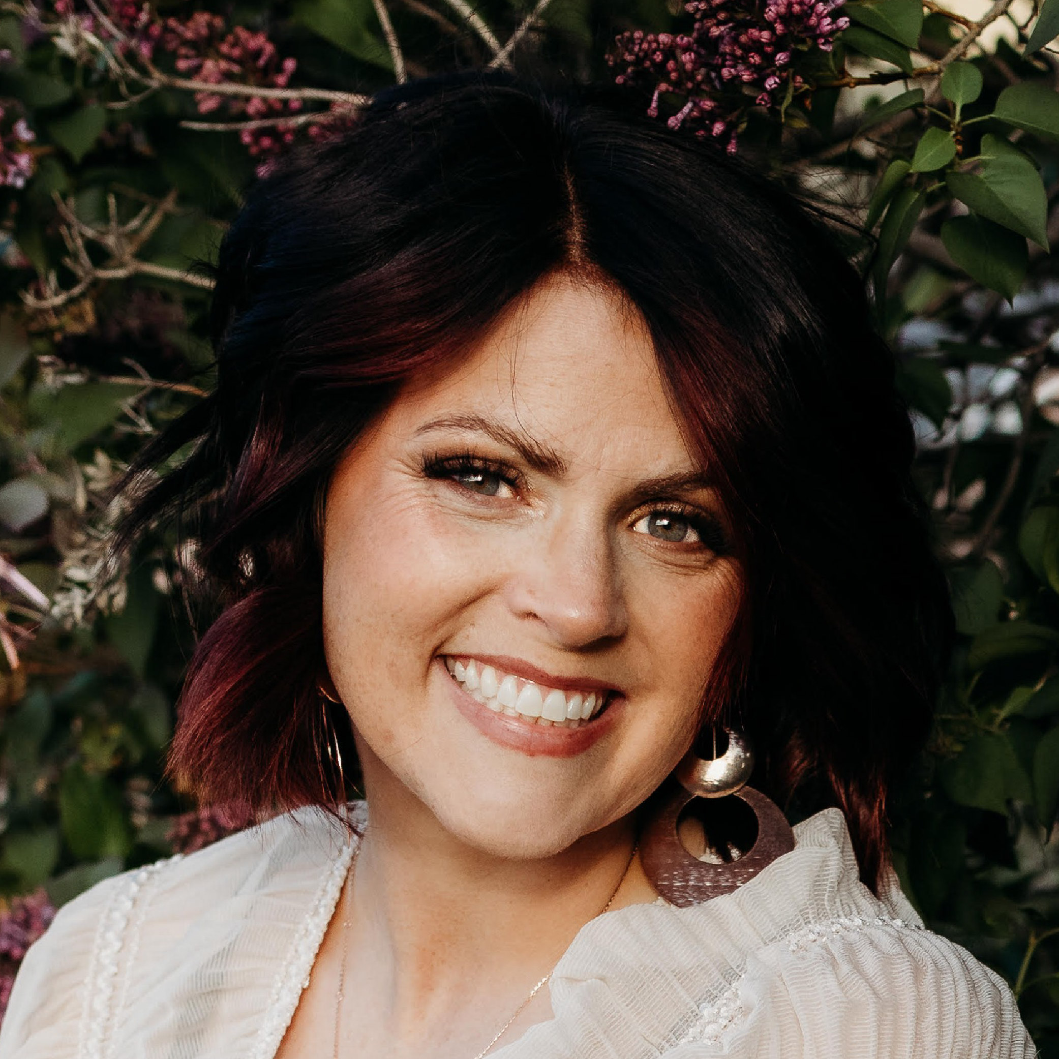 Professional headshot of Emily Aurich, Real Estate Agent