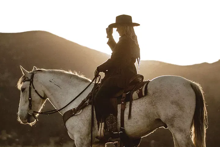 A Woman and Her Horse at Osprey Ranch