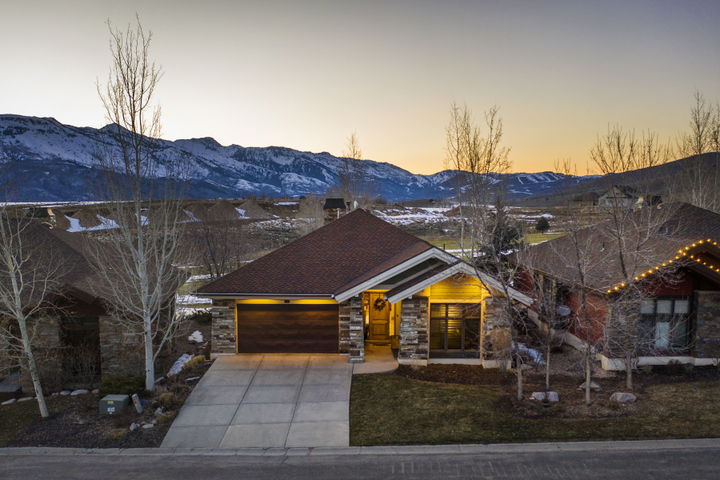 Drone Shot of Beautiful Home in The Fairways Showcasing Mountain Views