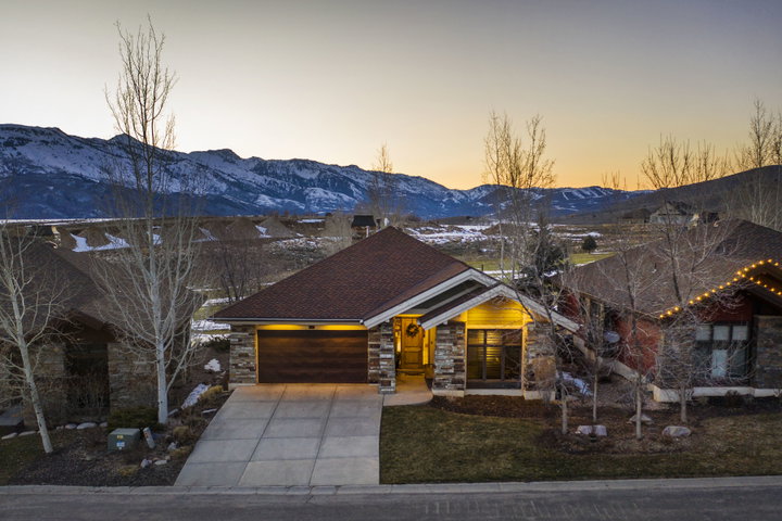 Drone Shot of Beautiful Home in The Fairways Showcasing Mountain Views