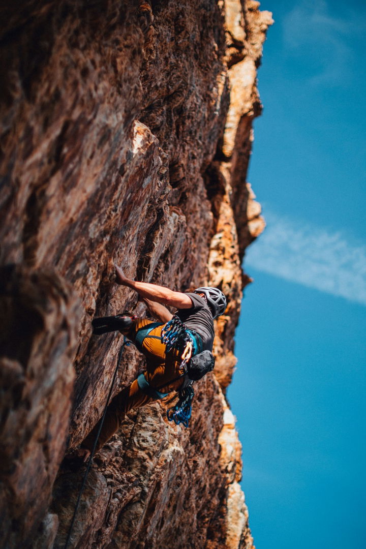 Rock climber on route